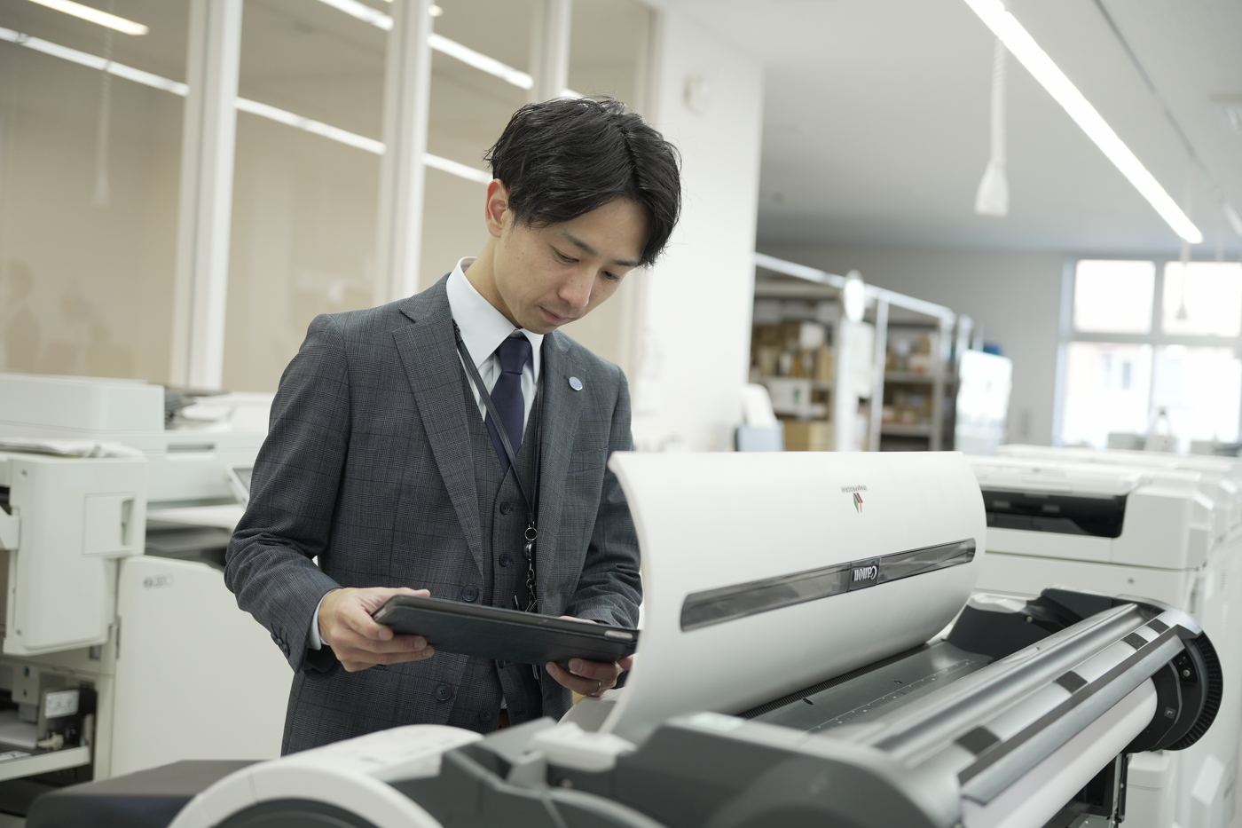 大判プリンターを調整するICTサービス